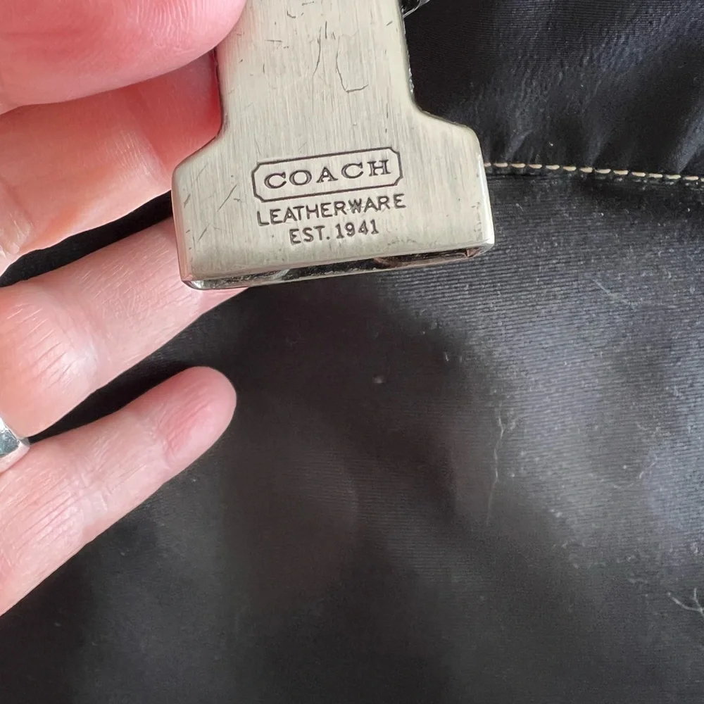 Vintage Coach black nylon leather trimmed flap messenger bag adjustable strap.